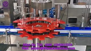 2211 J118 Máquina llenadora al vacío de botellas de vidrio de tipo dividido y tapadora con pestaña lateral