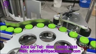 2129 M4 Etiquetadora Automática Rotativa para Botellas de Vidrio con Triple Tapón de Rosca y Etiqueta Autoadhesiva