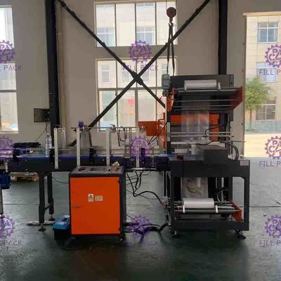 L mecanografía el control del PLC de la empaquetadora del encogimiento para la cadena de producción automática