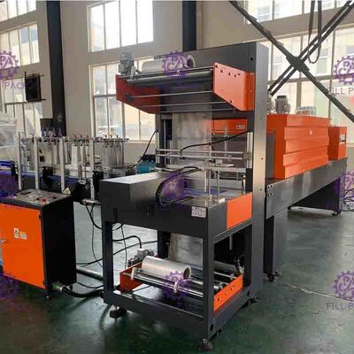 L mecanografía el control del PLC de la empaquetadora del encogimiento para la cadena de producción automática